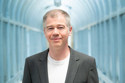 Dr. Tim Happel